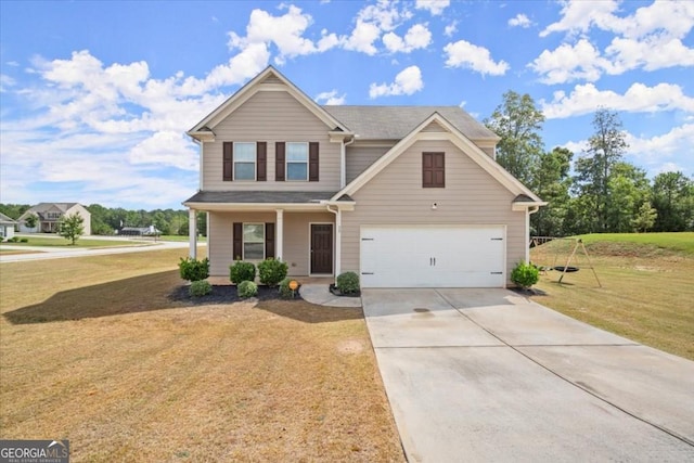 view of front of property featuring a front lawn, a garage, and covered porch