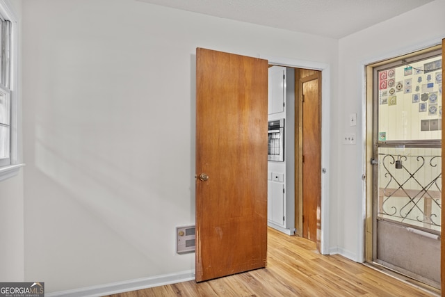 unfurnished bedroom featuring light hardwood / wood-style floors