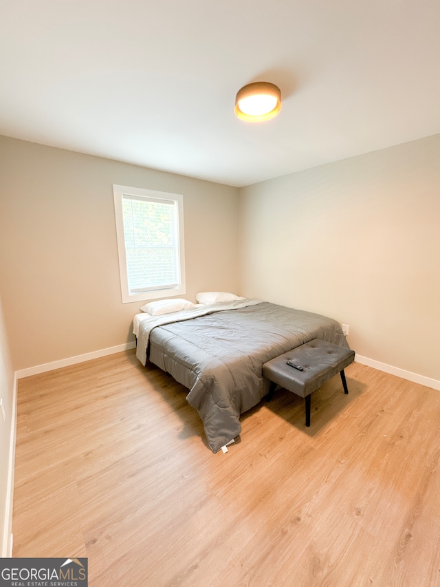 bedroom featuring light hardwood / wood-style flooring