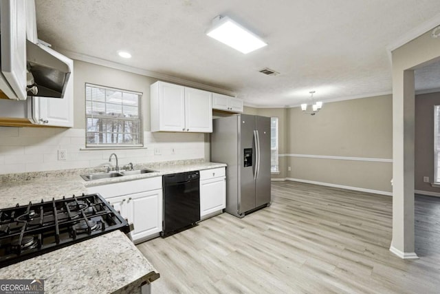 kitchen featuring stainless steel refrigerator with ice dispenser, dishwasher, white cabinets, and sink