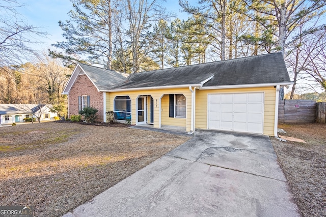 single story home with a garage and a porch