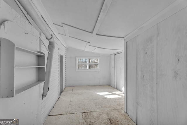 interior space featuring vaulted ceiling