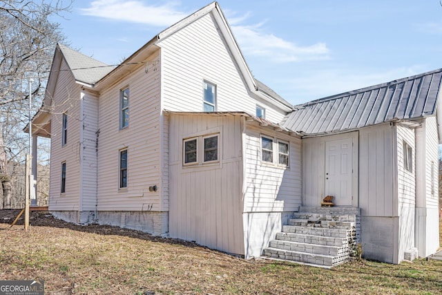 view of home's exterior featuring a lawn