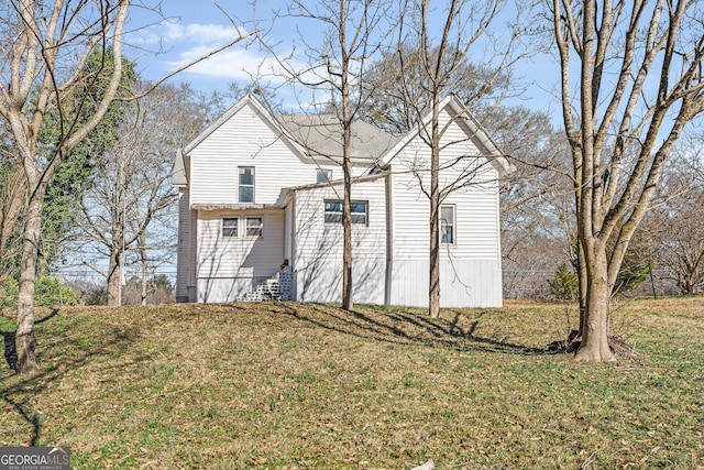 exterior space with a front yard