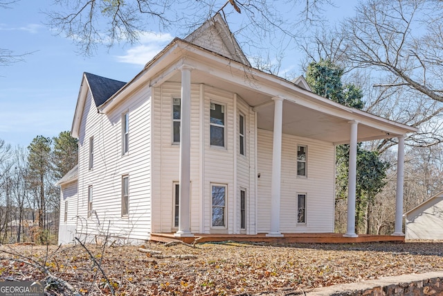 view of home's exterior featuring a porch