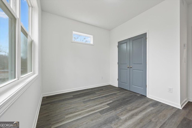 interior space with dark hardwood / wood-style flooring