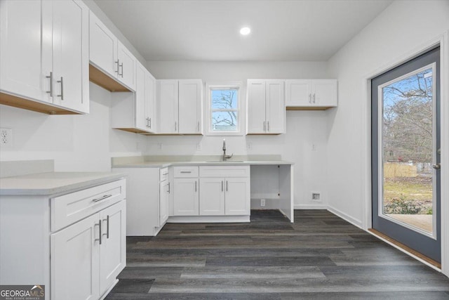 550 Paines Ave NW, Atlanta, GA 30318 - kitchen featuring white cabinets, dark wood-style flooring, recessed lighting, and light countertops