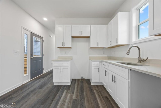 550 Paines Ave NW, Atlanta, GA 30318 - kitchen featuring white cabinetry, dark wood-style flooring, recessed lighting, and light countertops
