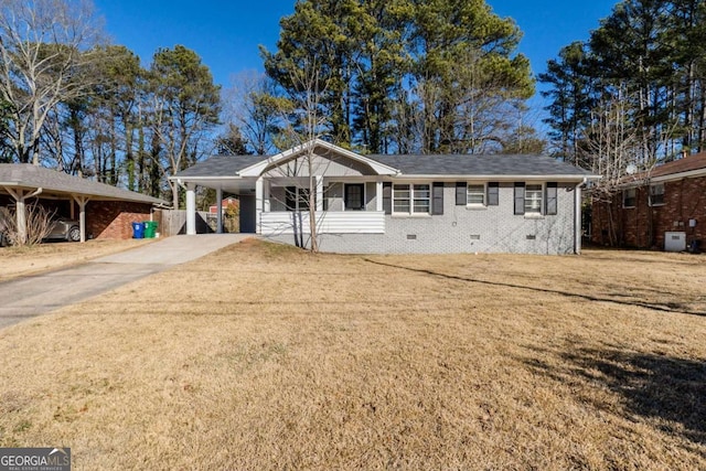 ranch-style home featuring a front lawn, central AC unit, and a carport