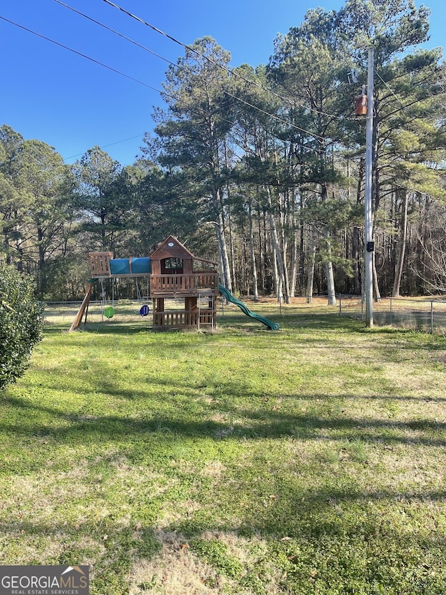 view of yard with a playground