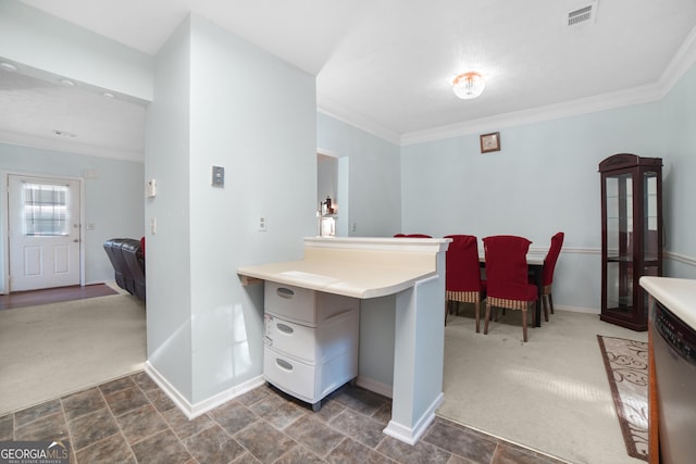 kitchen featuring ornamental molding and dark colored carpet