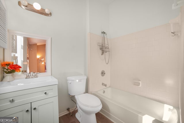 full bathroom with vanity, toilet, tiled shower / bath combo, and wood-type flooring