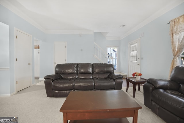 carpeted living room featuring crown molding