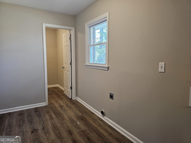 laundry room with dark wood-type flooring and hookup for an electric dryer