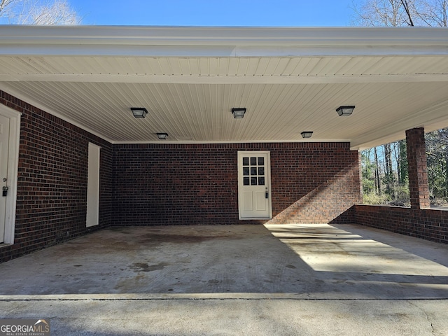 view of patio featuring a carport