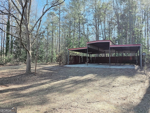 view of yard with a carport