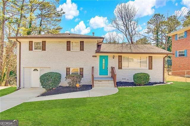 2629 Preston Dr, Decatur, GA 30034 - split level home featuring a garage and a front yard