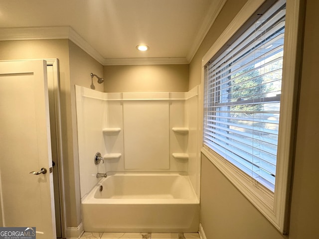 bathroom featuring tile patterned flooring, ornamental molding, and bathing tub / shower combination