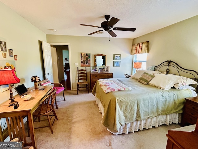 bedroom with light carpet and ceiling fan