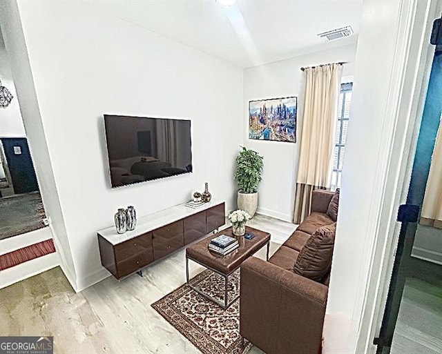 living room with hardwood / wood-style floors