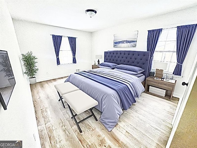 bedroom featuring wood-type flooring