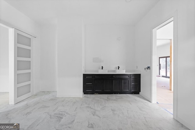 bathroom with built in features and vanity