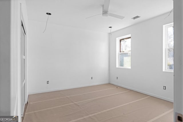 spare room featuring ceiling fan