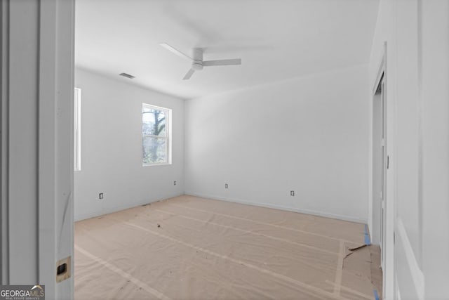 spare room featuring ceiling fan