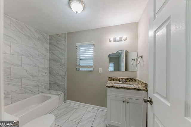 full bathroom with toilet, vanity, and tiled shower / bath combo