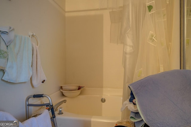 bathroom with a bathing tub