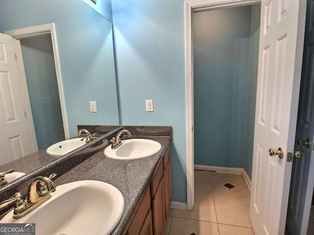 bathroom with vanity and tile patterned floors