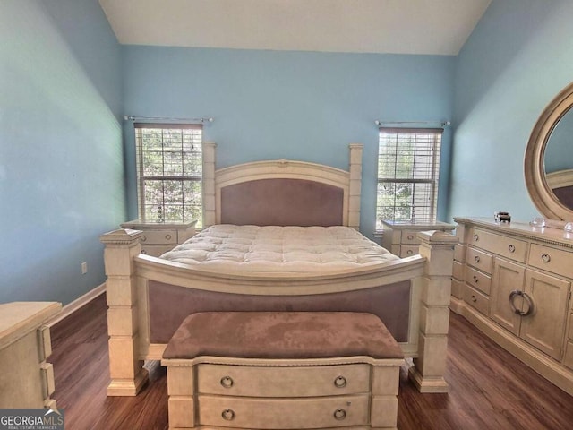 bedroom featuring dark hardwood / wood-style floors