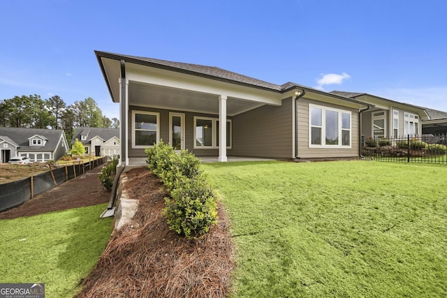 rear view of property with a patio