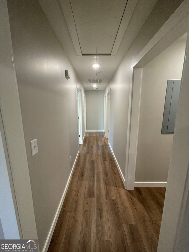 corridor featuring dark wood-type flooring