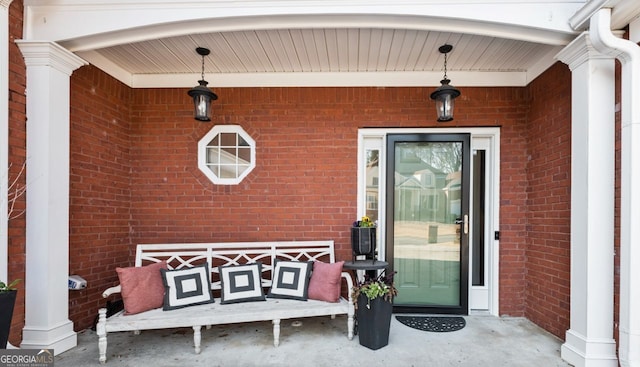 doorway to property with a porch