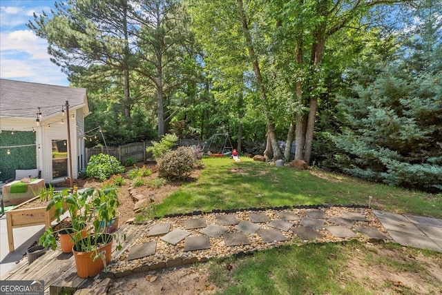 view of yard with a playground