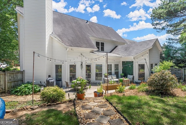 rear view of house with a patio area