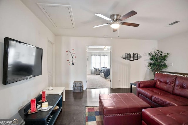 living room featuring ceiling fan