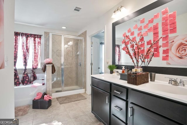 bathroom featuring vanity, separate shower and tub, and tile patterned flooring