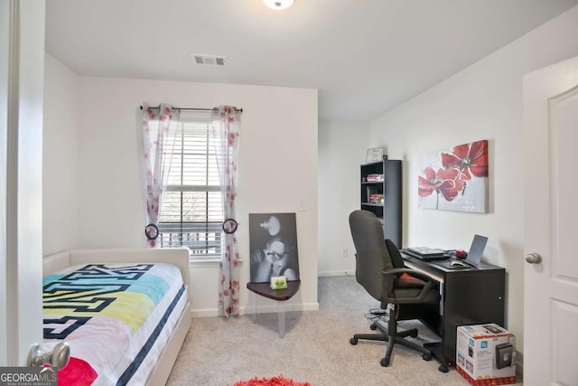 bedroom with light carpet