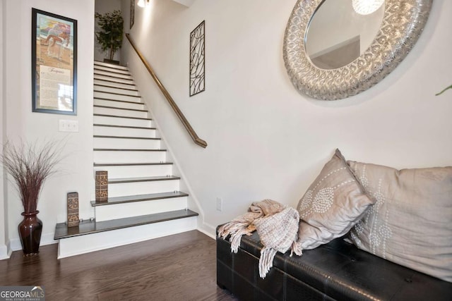 stairway with wood-type flooring