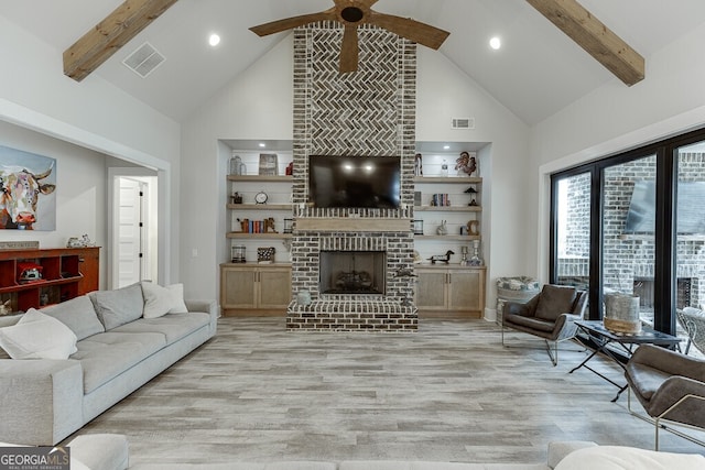 4621 Stanley Rd, Flowery Branch, GA 30542 - living area featuring light wood-type flooring, ceiling fan, high vaulted ceiling, beam ceiling, and recessed lighting