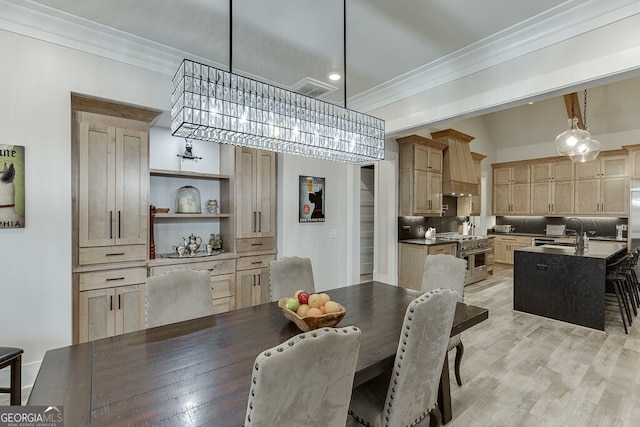 4621 Stanley Rd, Flowery Branch, GA 30542 - dining area featuring ornamental molding, light wood finished floors, and recessed lighting