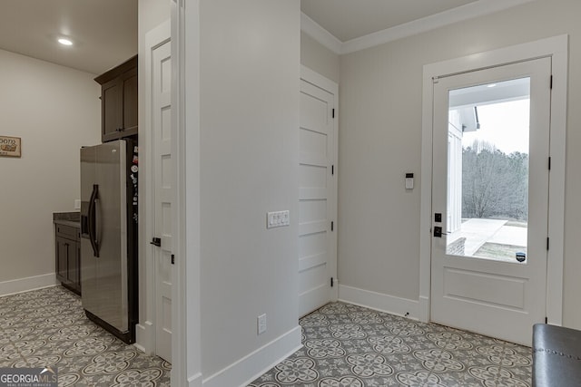 4621 Stanley Rd, Flowery Branch, GA 30542 - foyer featuring light tile patterned floors, baseboards, recessed lighting, and ornamental molding