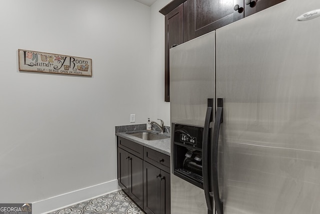 4621 Stanley Rd, Flowery Branch, GA 30542 - bathroom with baseboards, tile patterned flooring, and vanity