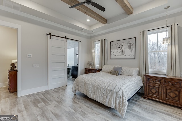 4621 Stanley Rd, Flowery Branch, GA 30542 - bedroom featuring a barn door, beam ceiling, light wood-type flooring, baseboards, and recessed lighting