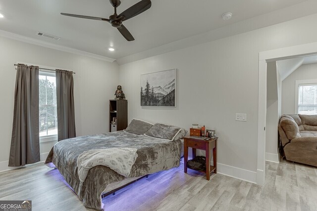 4621 Stanley Rd, Flowery Branch, GA 30542 - bedroom with light wood-type flooring, baseboards, ornamental molding, a ceiling fan, and recessed lighting