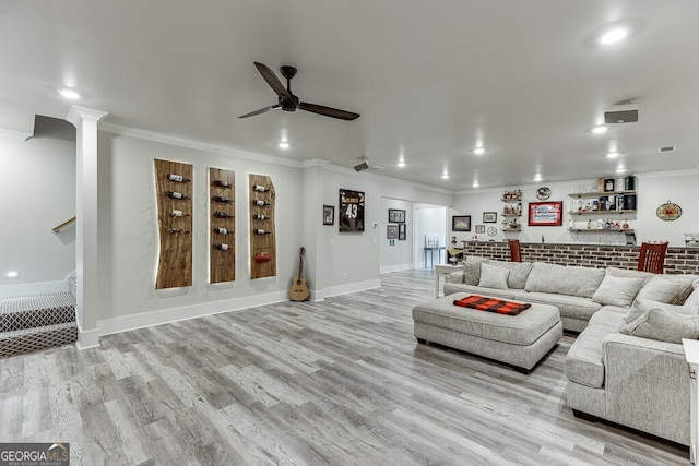 4621 Stanley Rd, Flowery Branch, GA 30542 - living room featuring ornamental molding, a ceiling fan, bar, light wood-style floors, and recessed lighting