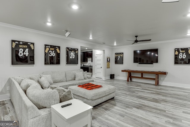 4621 Stanley Rd, Flowery Branch, GA 30542 - living room with ceiling fan, crown molding, baseboards, light wood-style flooring, and recessed lighting
