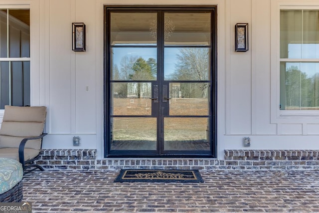 4621 Stanley Rd, Flowery Branch, GA 30542 - property entrance featuring french doors